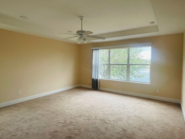 Building Photo - **SUNCOAST LAKES GATED COMMUNITY**