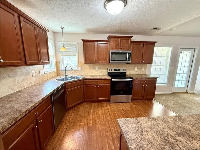 Building Photo - 2513 Hunting Bow Dr