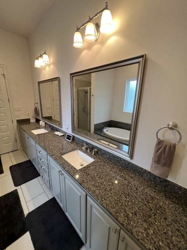 Building Photo - Luxury 4BR Home in Americana | 11 Ft Ceilings, Courtyard Living & Furnished Option at $3,950