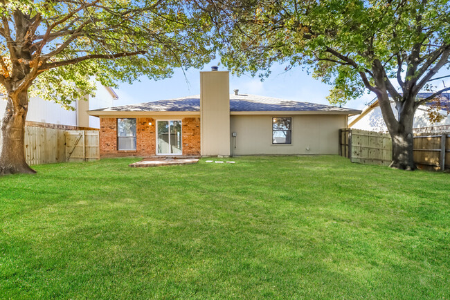 Building Photo - Charming Brick Home with Modern Touches in...