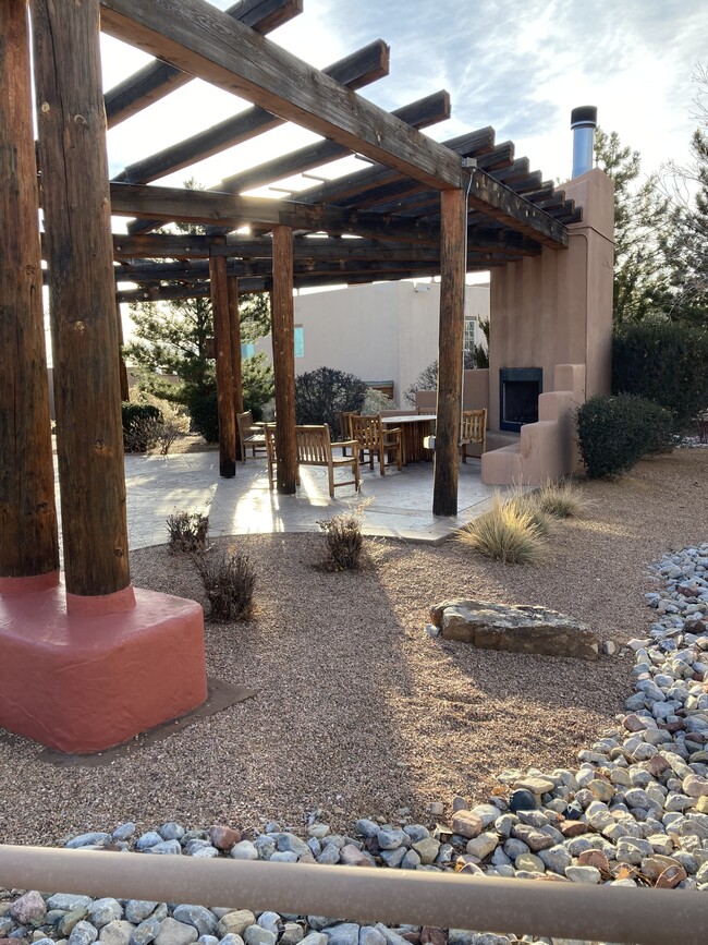 Community patio is steps away from private unit patio - 2210 Miguel Chavez Rd