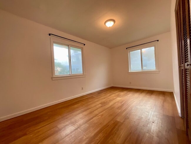 Building Photo - Beautiful, Bright & Airy Beach House--3Beds, 2Baths with Yard