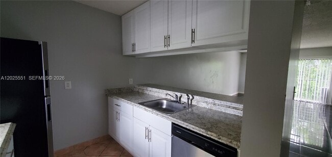 Building Photo - 8540 N Sherman Cir