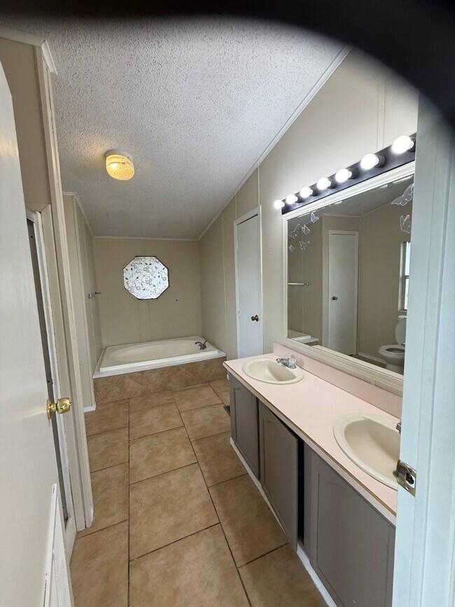 Building Photo - 6575 N Pelto Path