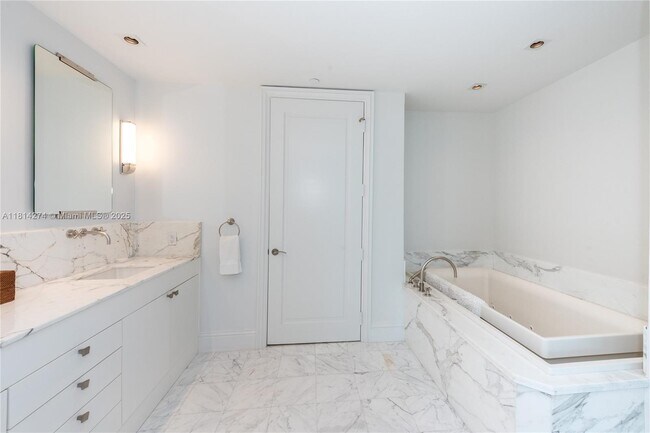 Building Photo - 10295 Collins Ave
