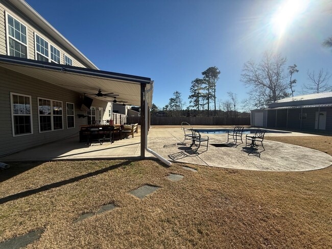 Building Photo - Amazing home with custom touches and in-ground pool