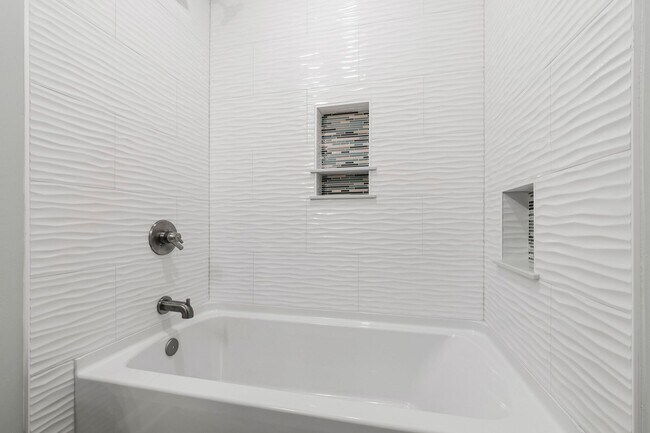Building Photo - Rare Find: Updated and Modern End-Unit Tow...