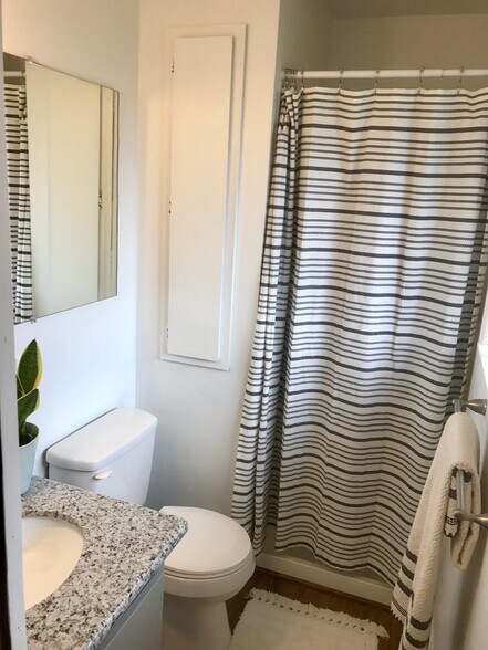 Master bedroom full bathroom. - 8038 N Wayland Ave