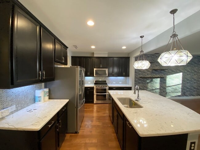 Building Photo - Immaculate Hillsborough Townhome
