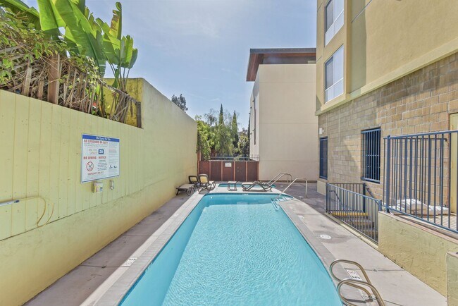 Building Photo - Modern Living Meets Urban Charm in Bankers...