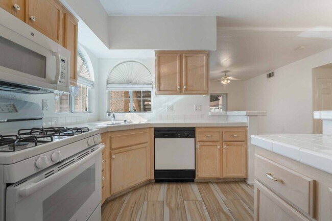 Building Photo - Charming First-Floor Home with Open Living and Private Patio