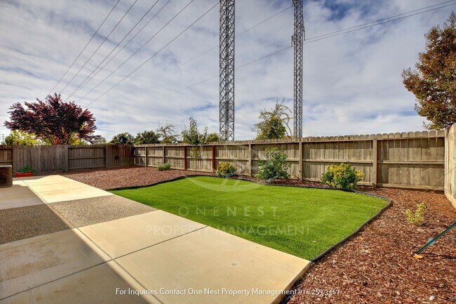 Building Photo - Charming single-story home nestled in the serene Edgewater Community