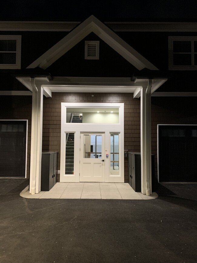 Resident entry at night - 16500 Boones Ferry Rd