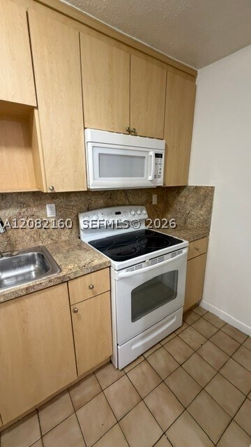 Building Photo - 6070 W 18th Ave