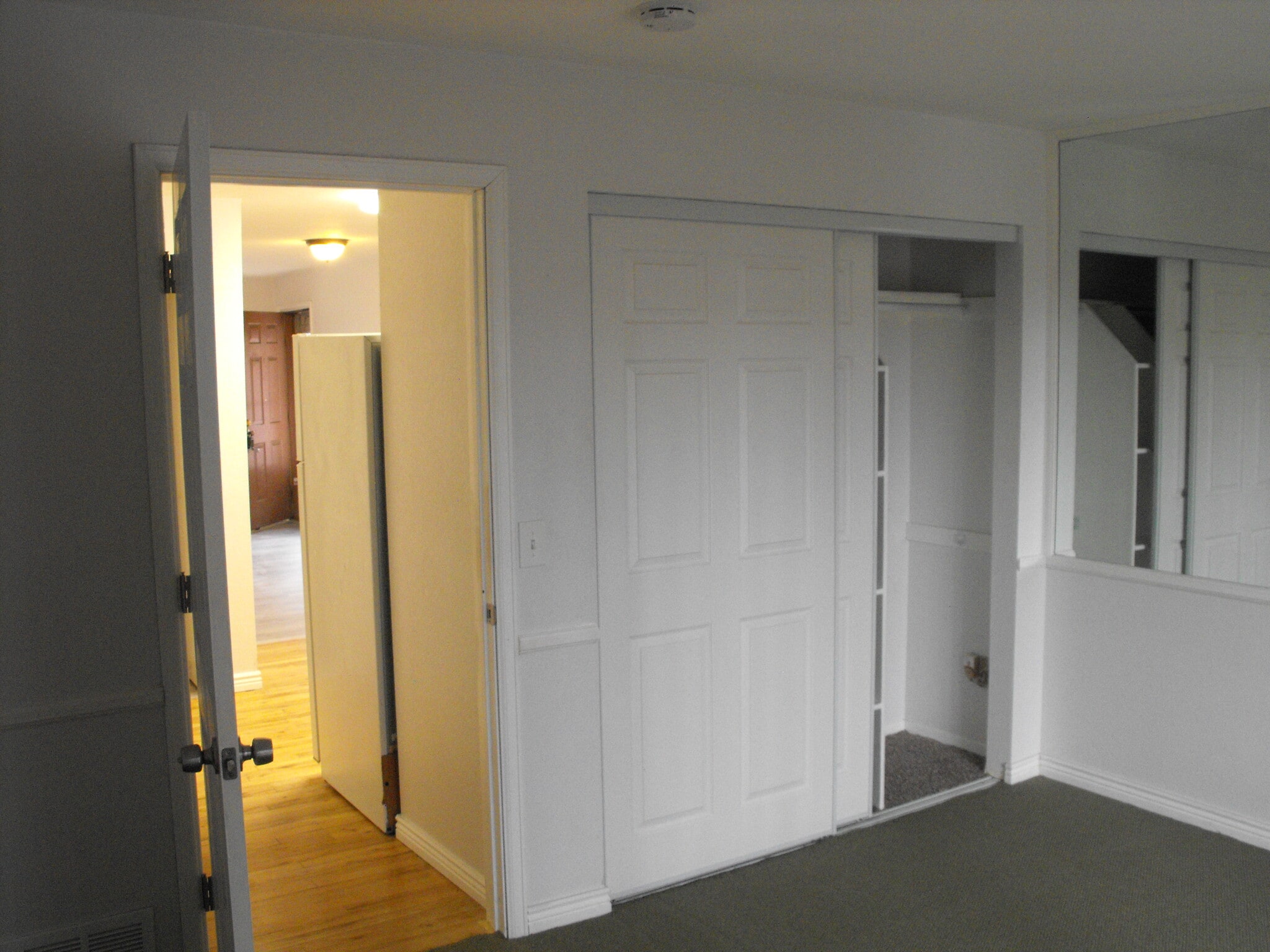 Bed roon looking towards door to kitchen - 165 S Sable Blvd