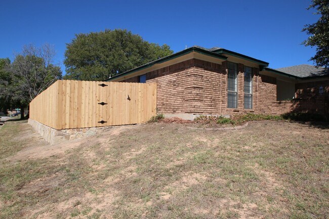 Building Photo - Corner Lot Charmer Off Chapel Creek | 4BR/2BA with Fireplace, Garden Tub & Fenced Backyard
