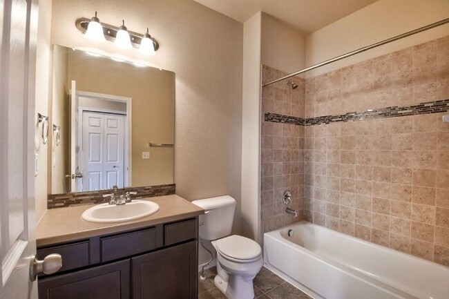 Building Photo - Immaculate 3-Bedroom Townhome with Stainless Steel Appliances and Attached Garage Near Peterson SFB