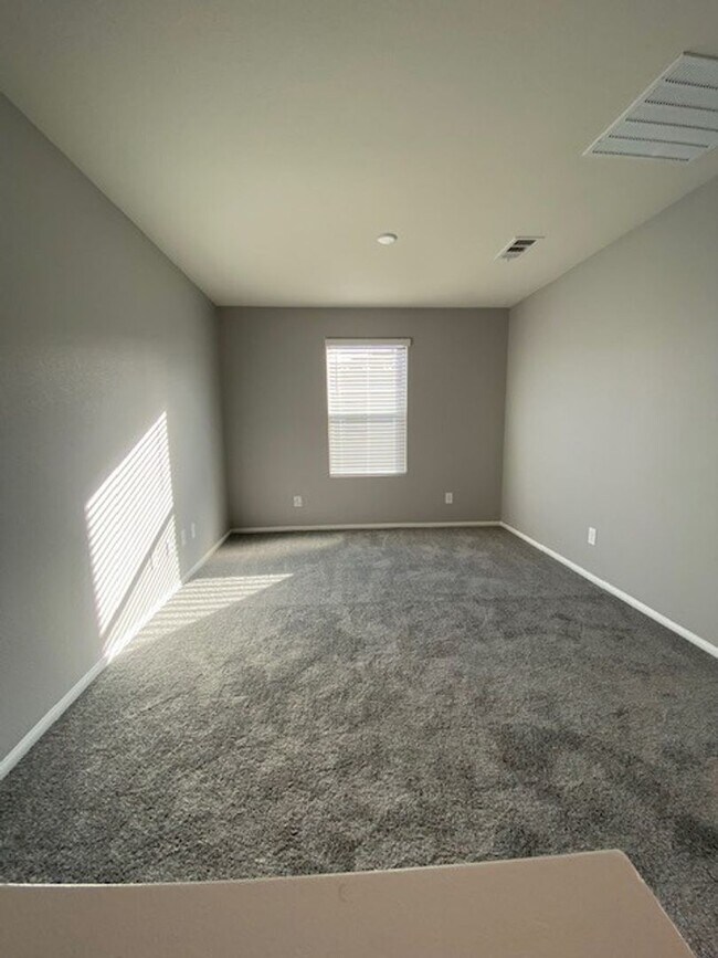 Building Photo - Modern North Las Vegas Townhome with Granite Countertops, Covered Patio & Open-Concept Living