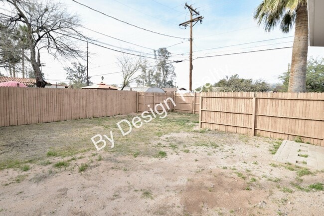 Building Photo - Sun-Drenched Mid-Century Living Near Garden District