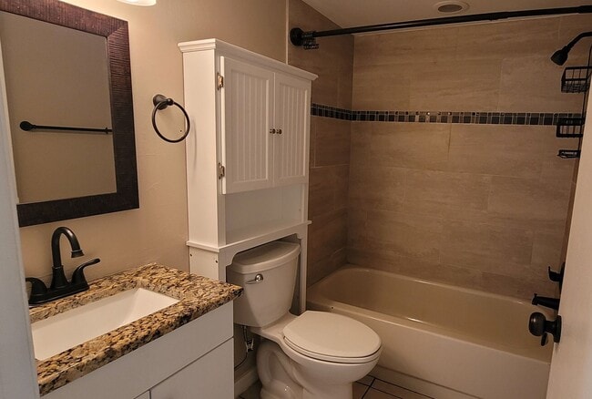 Building Photo - Modern One-Story Ground Floor Condo, Conve...