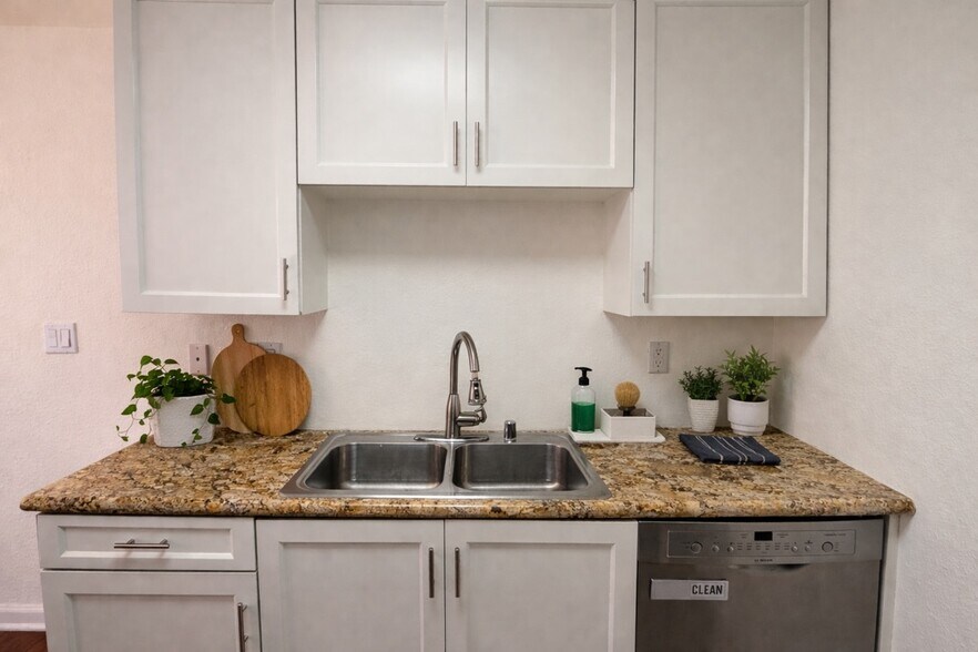 Fully renovated kitchen — white shaker cabinets, granite countertops, Bosch dishwasher - 970 Palm Avenue