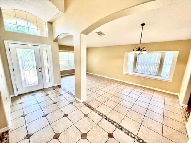 Building Photo - EAGLE CREEK LAKE NONA! WELCOME HOME! Beautiful water views! Spacious 2 story-3 bedroom 2.5 bath h...