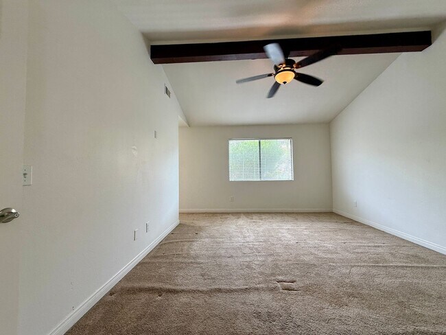 Building Photo - Spacious 4 Bedroom House with Large Fenced Yard! Landscaping Included! Two Car Garage!