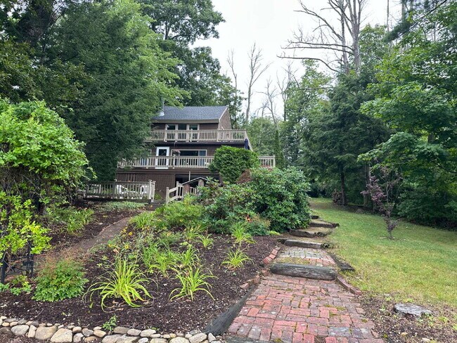 Building Photo - Peaceful Waterfront Living: 2-Story Home on River Road with Ample Outdoor Storage & Water Extras!