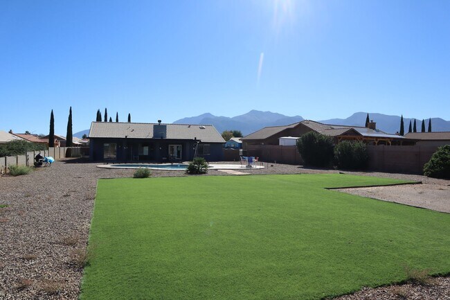 Building Photo - Home With A Pool and Much More!