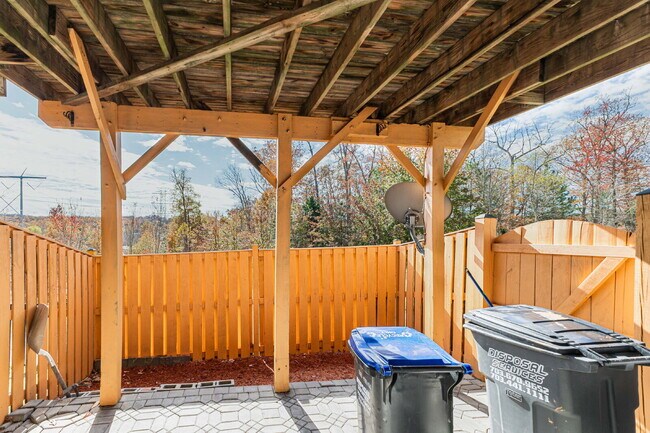 Building Photo - This beautiful townhouse has everything you need in a dream home.