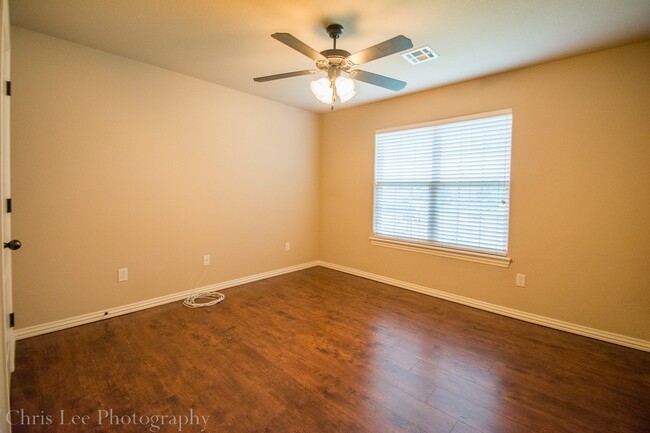 Building Photo - Three bedroom Home with Hardwood Floors Th...