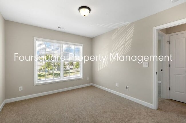 Building Photo - Cozy Townhome with Fireplace, Private Back Patio,  Near US-1, I-540 & Shopping