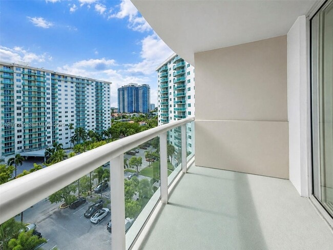 Building Photo - 19380 Collins Ave