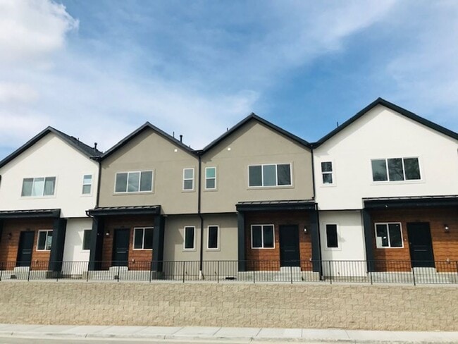 Building Photo - Beautiful new construction townhouse with quartz countertops and 2 car garage