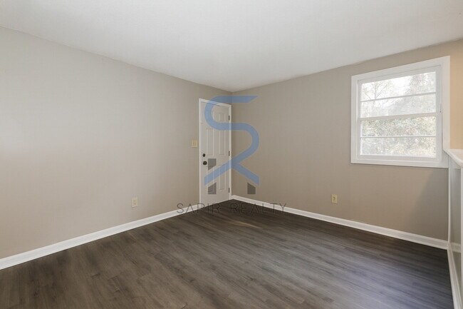 Building Photo - Move in before December 15th and choose your reward: a $250 Amazon Gift Card or a 55" Smart TV!