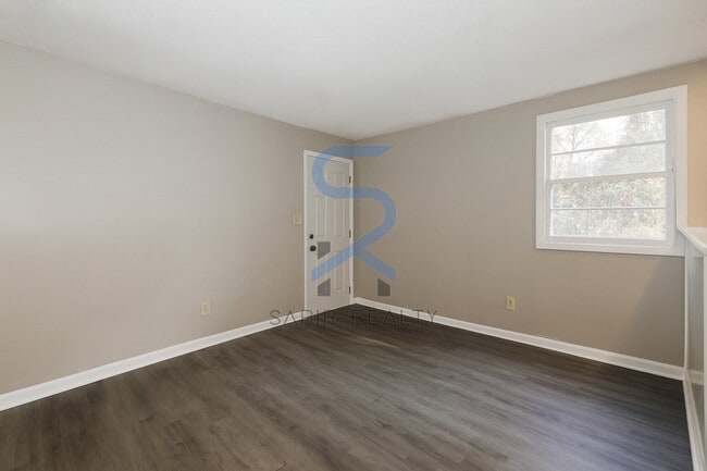 Building Photo - Move in before January 15th and choose your reward: a $250 Amazon Gift Card or a 55" Smart TV!