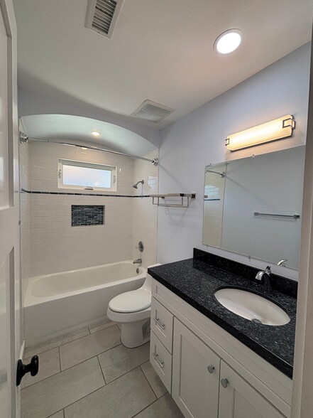 Beautiful custom tile & granite countertops. - 22471 Loch Lomond Dr
