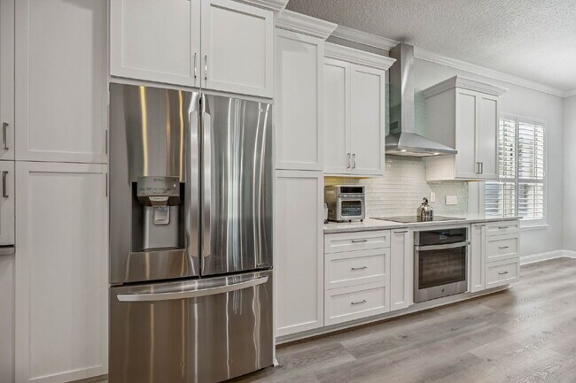 Building Photo - Coastal Living Just 2 Blocks from the Beach | Gated Community + Resort Amenities