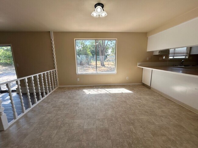 Building Photo - Corner Lot Home w/ Giant Yards, Covered Patio & Minutes to Boise Spectrum Center!