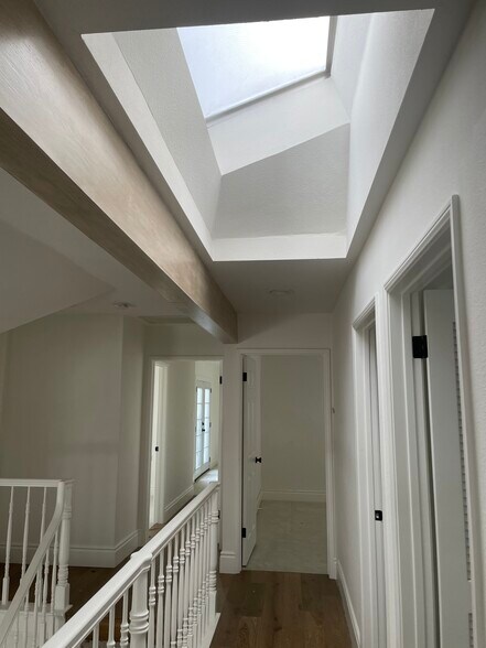 Upper landing leading to Main Suite - 2220 Curtis Ave