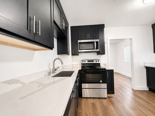 Building Photo - Fully Remodeled 4-Bedroom, 3-Bath Home with Garage and Private Fenced Yard – North Seattle