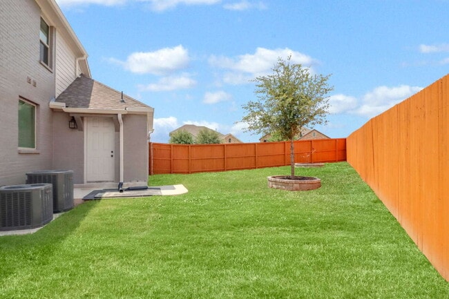 Building Photo - "Spacious 4-Bedroom Sanctuary with Cozy Fireplace in San Antonio's Prime Location!"