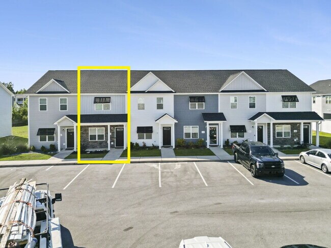 Building Photo - Available Now! Enjoy low-maintenance coastal living in this beautiful 2-bedroom, 2.5-bath townhom...