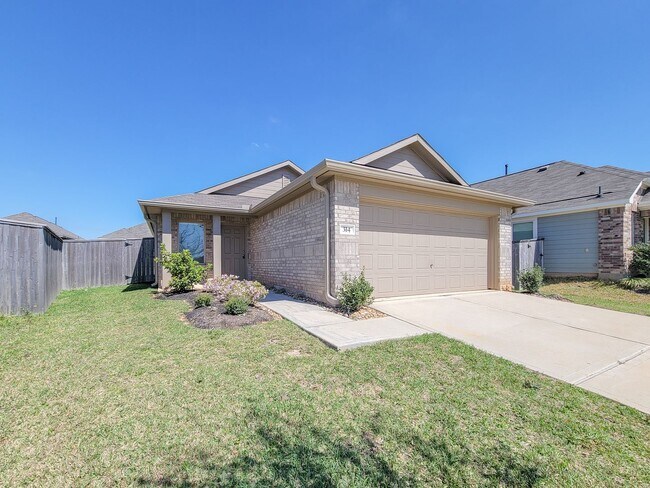 Building Photo - This single-story home has a comfortable layout with three bedrooms and a living area all on one ...