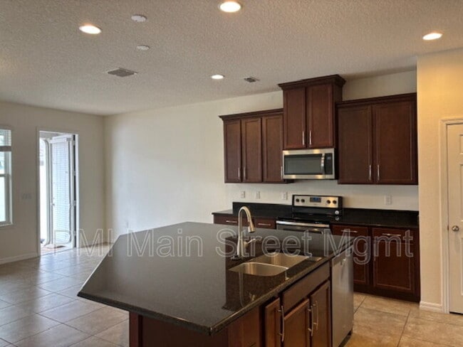 Building Photo - 8130 Red Stopper Ln