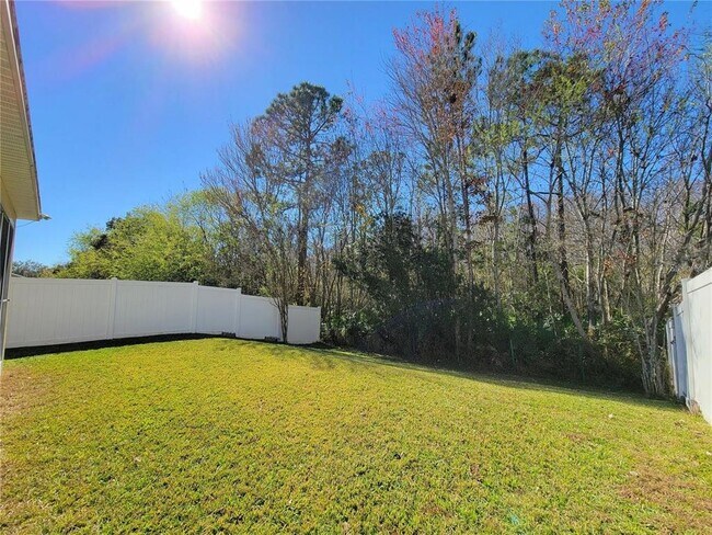 Building Photo - 9722 Moss Rose Way