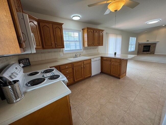 Building Photo - 4 Bedrooms, Big Yard & Top Schools – Don’t...
