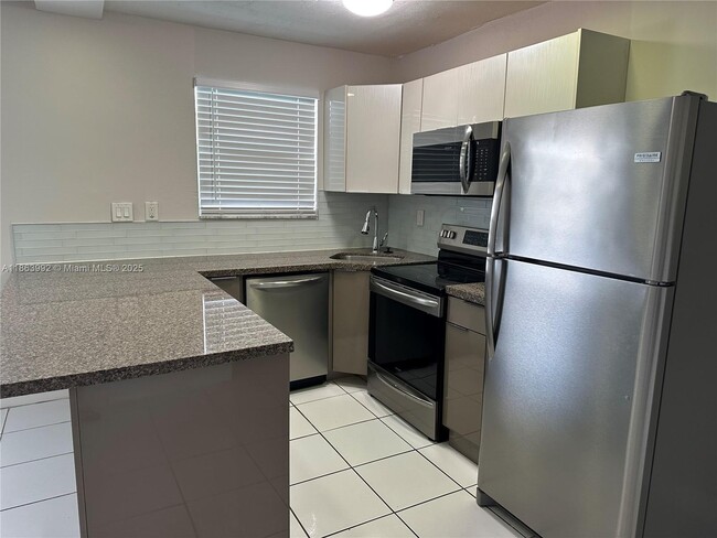 Building Photo - $1,700MONTHLY;1975 NE 135TH STREET #3E NOR...