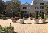 Building Photo - 8889 Caminito Plaza Centro