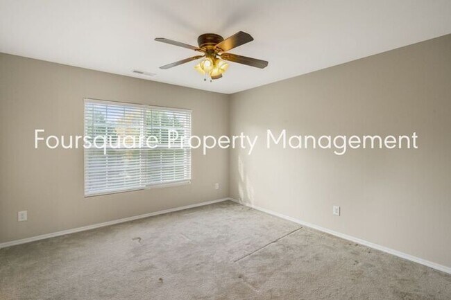 Building Photo - Charming Townhome with Open Layout, Back Patio & One-Car Garage – Near RTP, RDU & Everyday Conven...